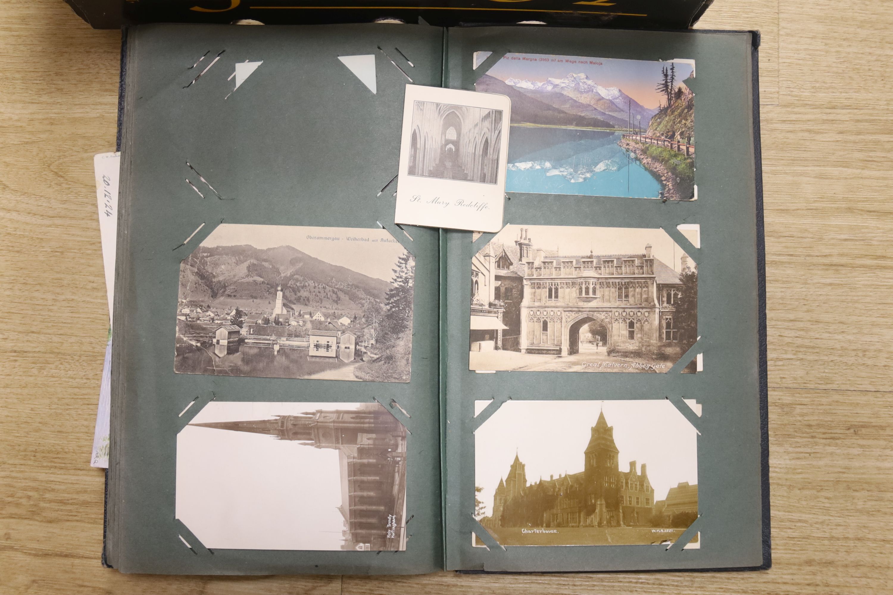 Three photograph albums and loose photos plus three postcard albums and a quantity of European currency